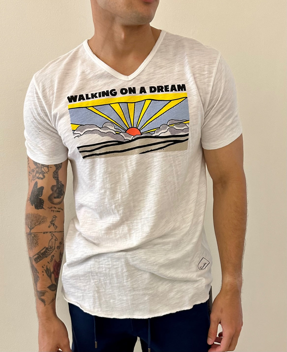 "WALKING ON A DREAM" on our 4 Corners Vneck (White)