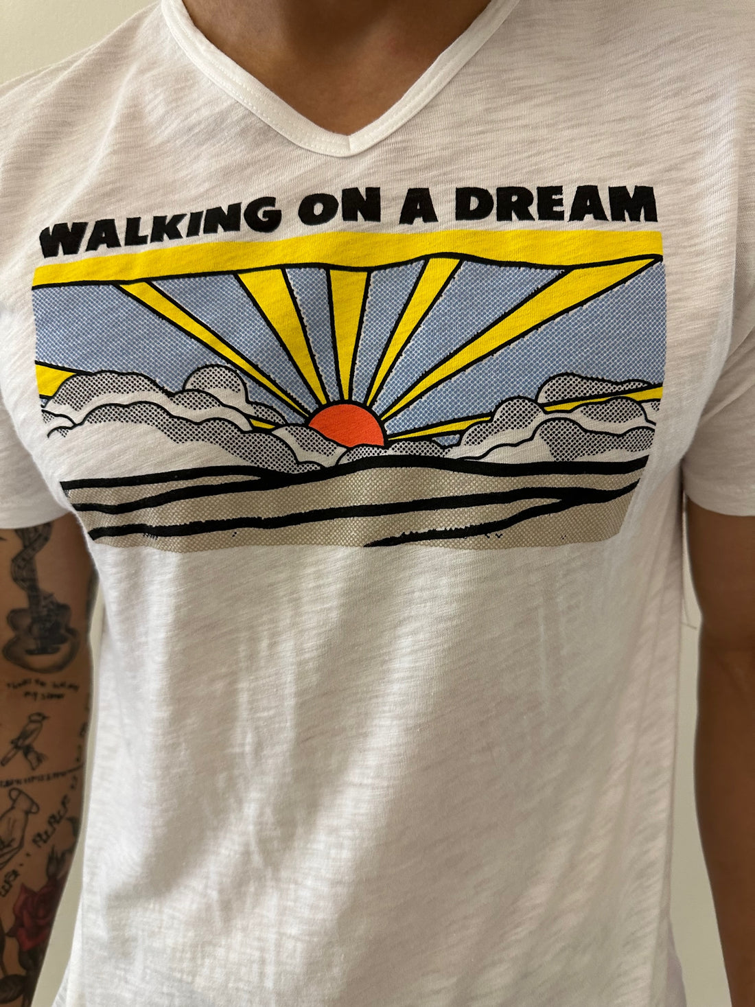 "WALKING ON A DREAM" on our 4 Corners Vneck (White)
