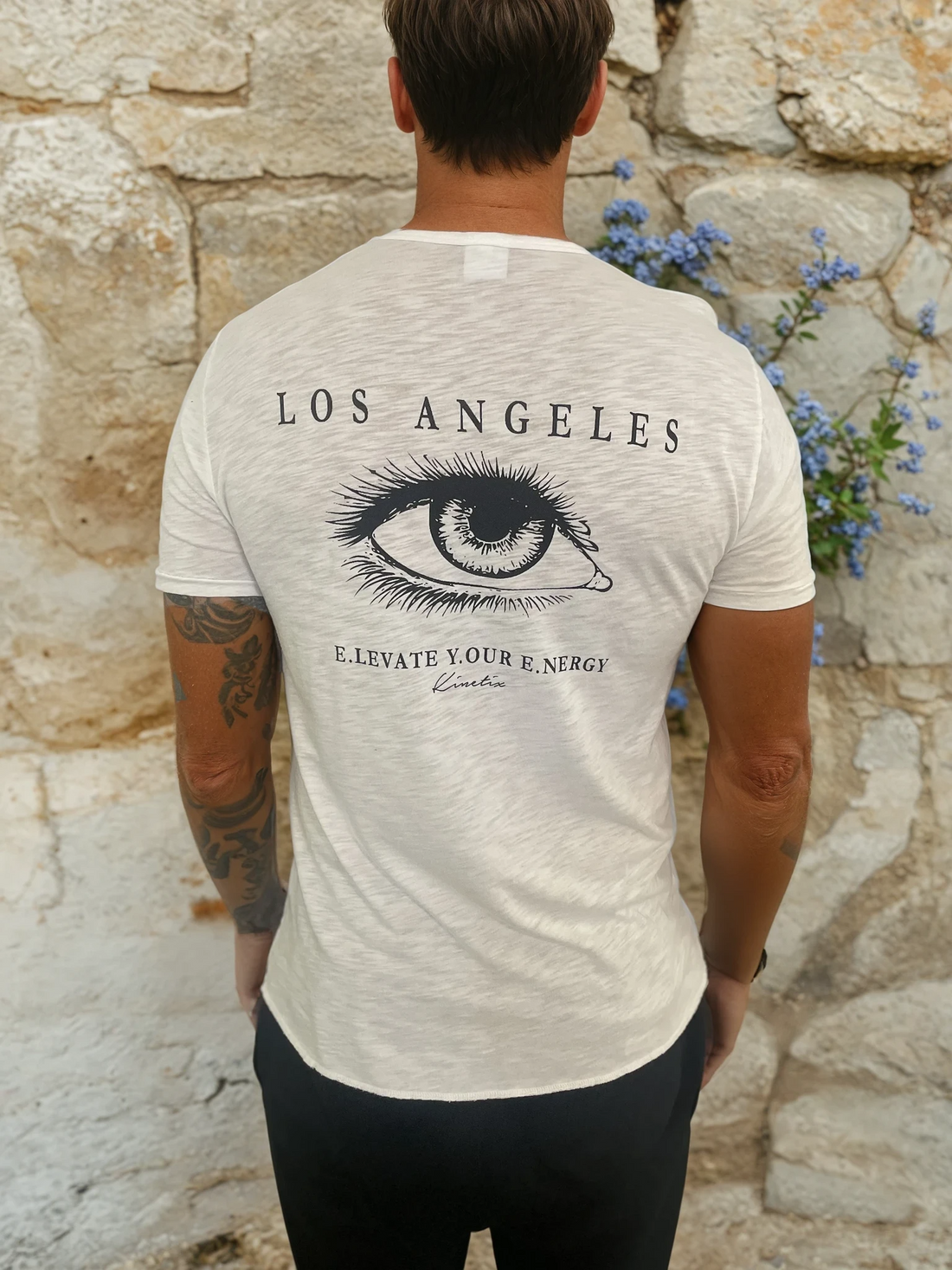 "Elevate Your Energy" on our 4 Corners Crew neck (White)